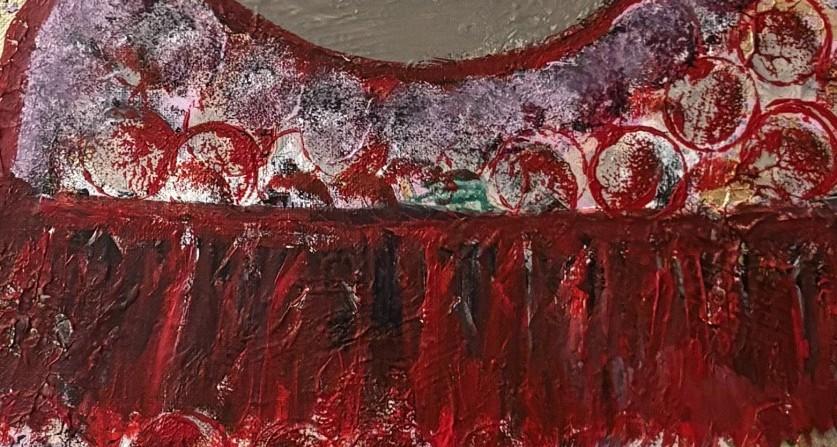 Close view of layered crimson paint over blush and grey, with pressed circular marks and visible brush texture.