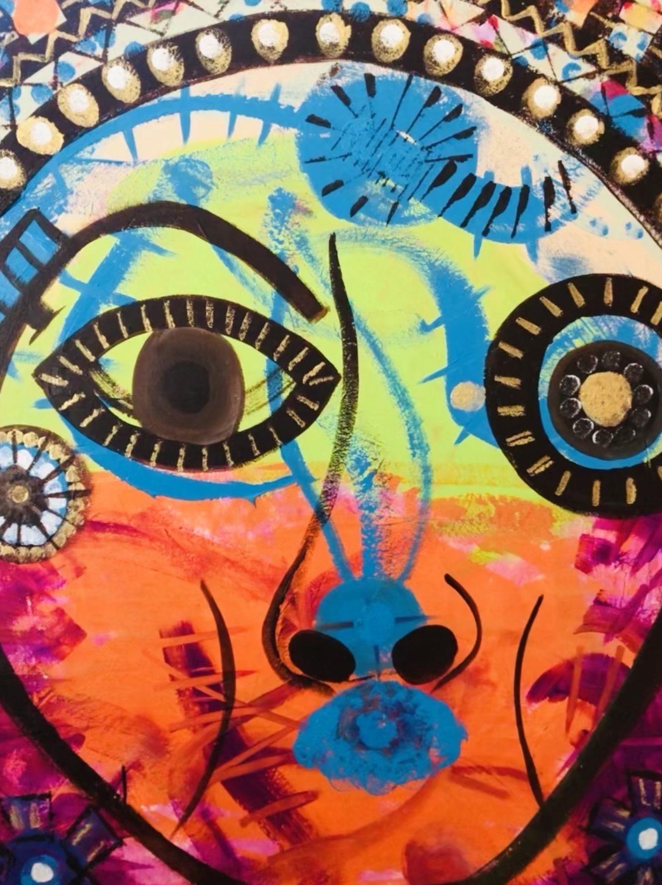 Mixed-media painting of a face at close range: one large eye outlined in black with gold lashes, chartreuse and burnt orange fields, turquoise rays, and a patterned band of black, gold and white dots across the top.